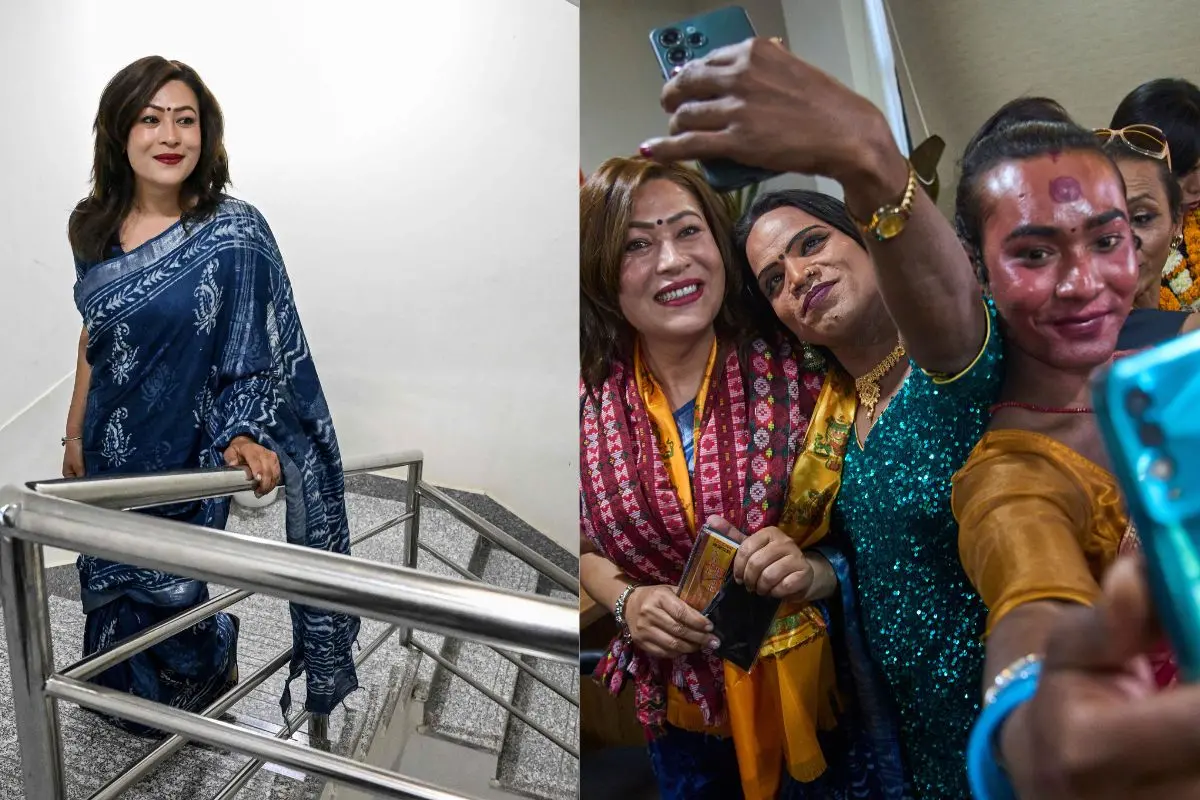 Nepal's first elected transgender woman lawmaker Bhumika Shrestha, Bhumika Shrestha, wearing a ceremonial yellow scarf, first transgender individual elected to Nepal's federal parliament under the proportional representation system from the Rastriya Swatantra Party, takes a selfie with other LGBTI+ member in an event organized to congratulate her | Photos: AP, AFP