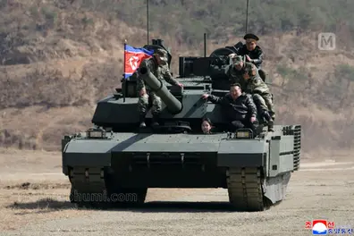 N Korean leader Kim Jong Un’s daughter seen driving tank, fueling succession buzz