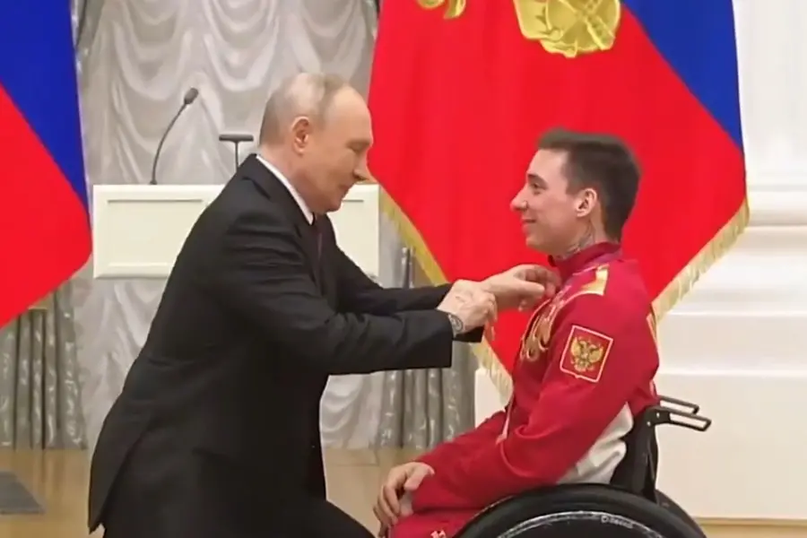Putin Kneels to Award Russian Paralympic Skier Ivan Golubkov