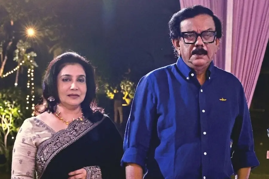 Director Priyadarshan and actress Lissy posing together at a social gathering, reflecting their recent reunion
