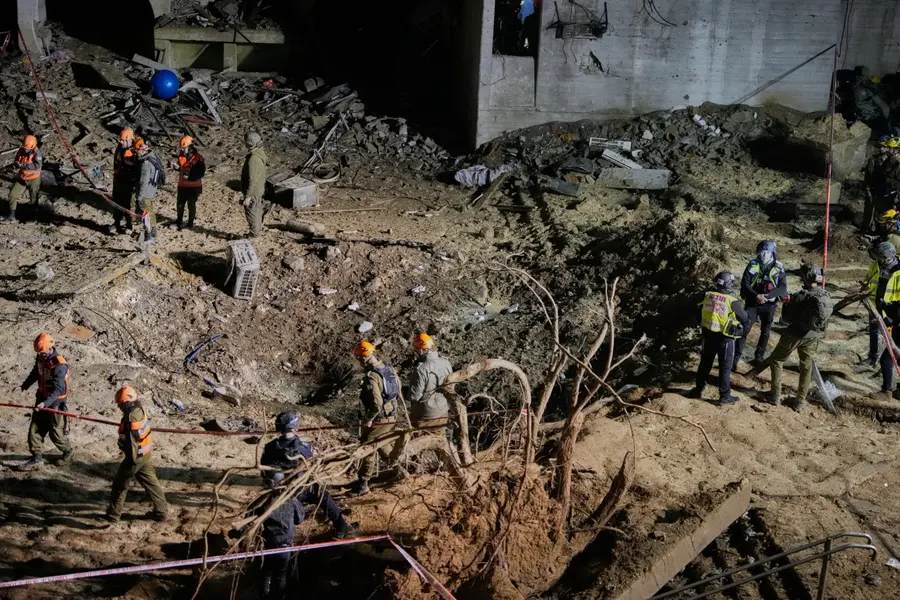 Crater left by an Iranian missile in Arad