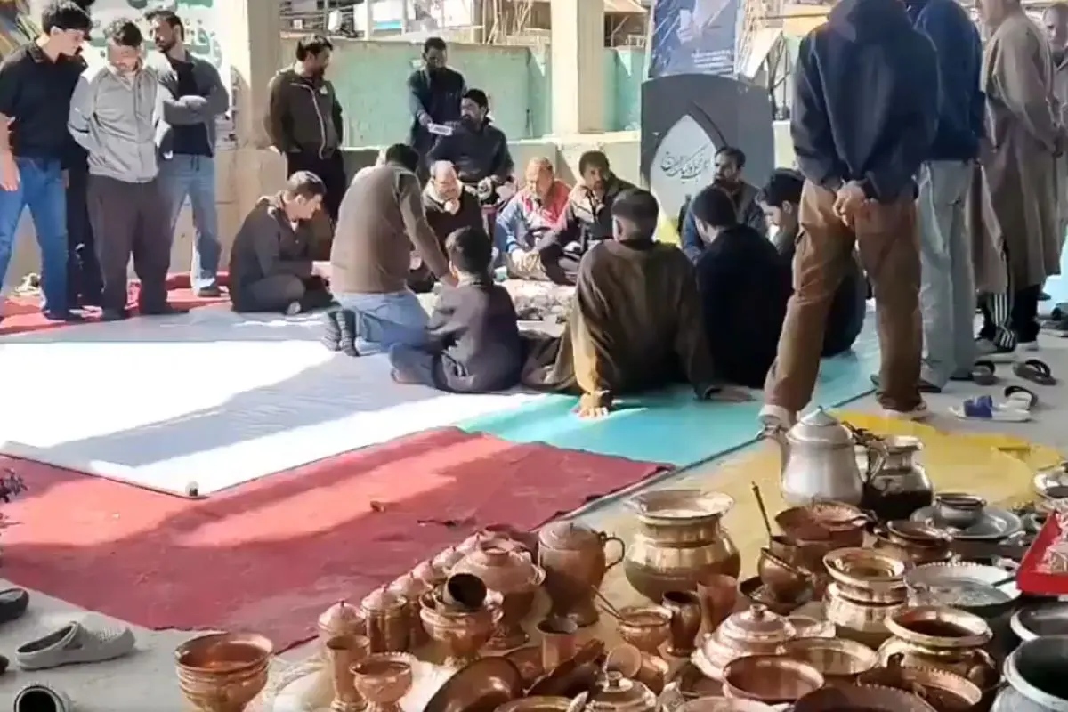 Kashmiris gather to contribute cash, copper utensils, and valuables during a community donation drive for war-hit Iran, in a moving show of solidarity and compassion. Screengrab: X