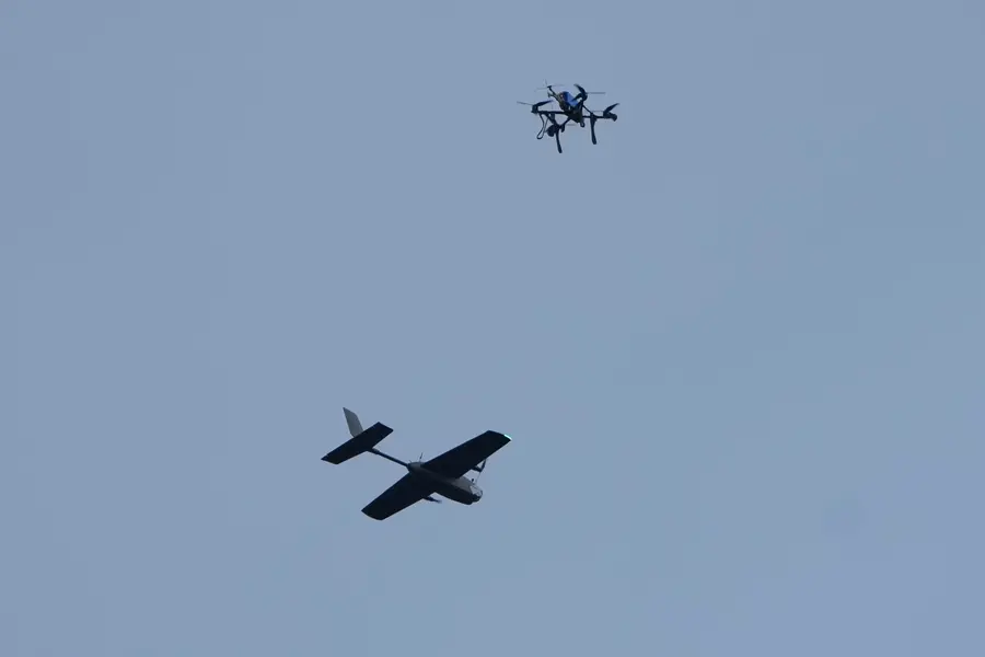 A drone hunter intercepts a target drone during drills at the Yatagan School for Unmanned Aerial Systems in the Kyiv region, Ukraine