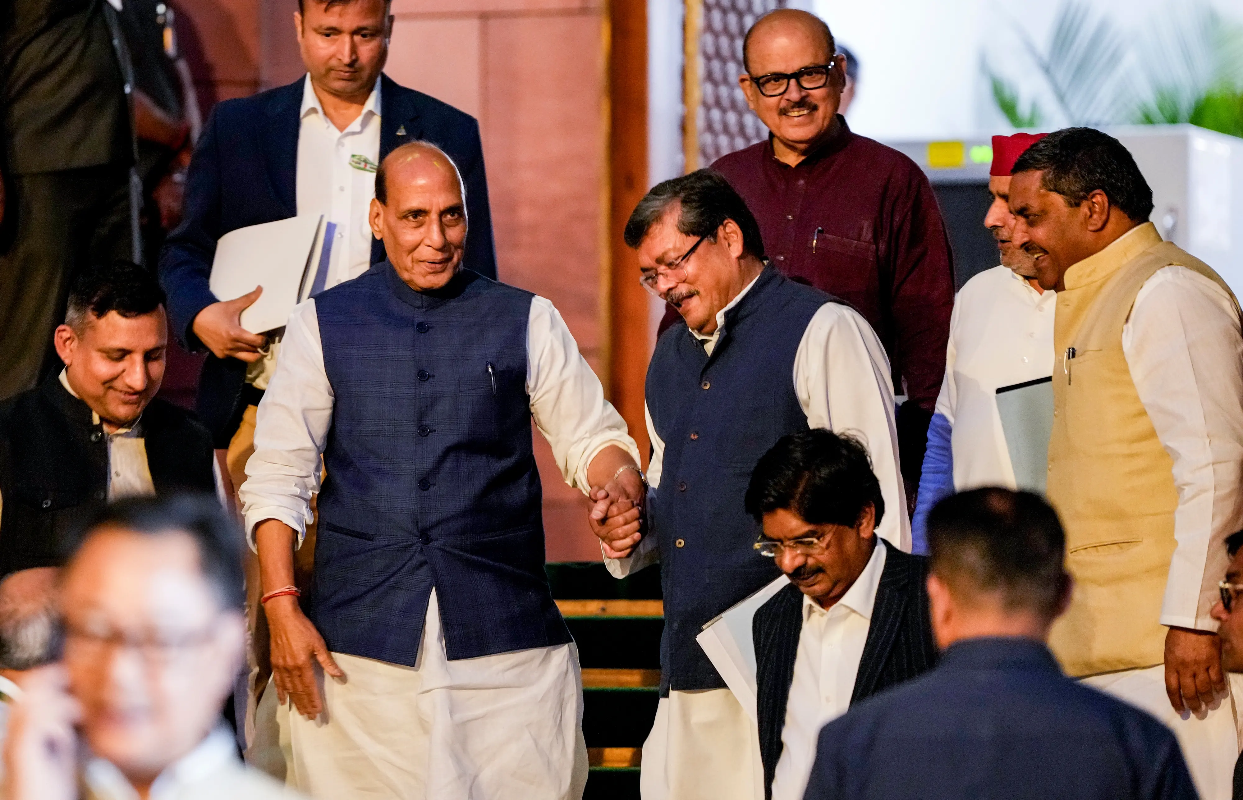 Union Defence Minister Rajnath Singh, Congress MPs Mukul Wasnik and Tariq Anwar, Samajwadi Party (SP) MP Dharmendra Yadav and others leave after the all-party meeting  | PTI