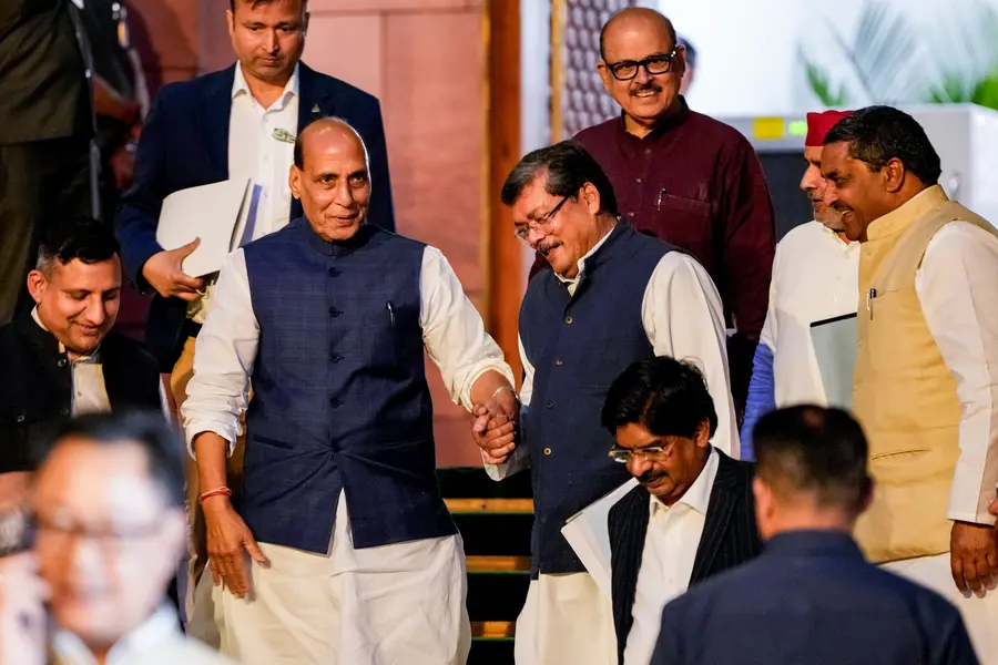 Union Defence Minister Rajnath Singh, Congress MPs Mukul Wasnik and Tariq Anwar, Samajwadi Party (SP) MP Dharmendra Yadav and others leave after the all-party meeting