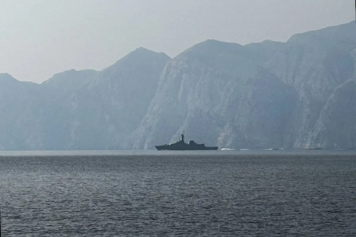 A navy vessel is seen sailing in the Strait of Hormuz | Photo: AFP