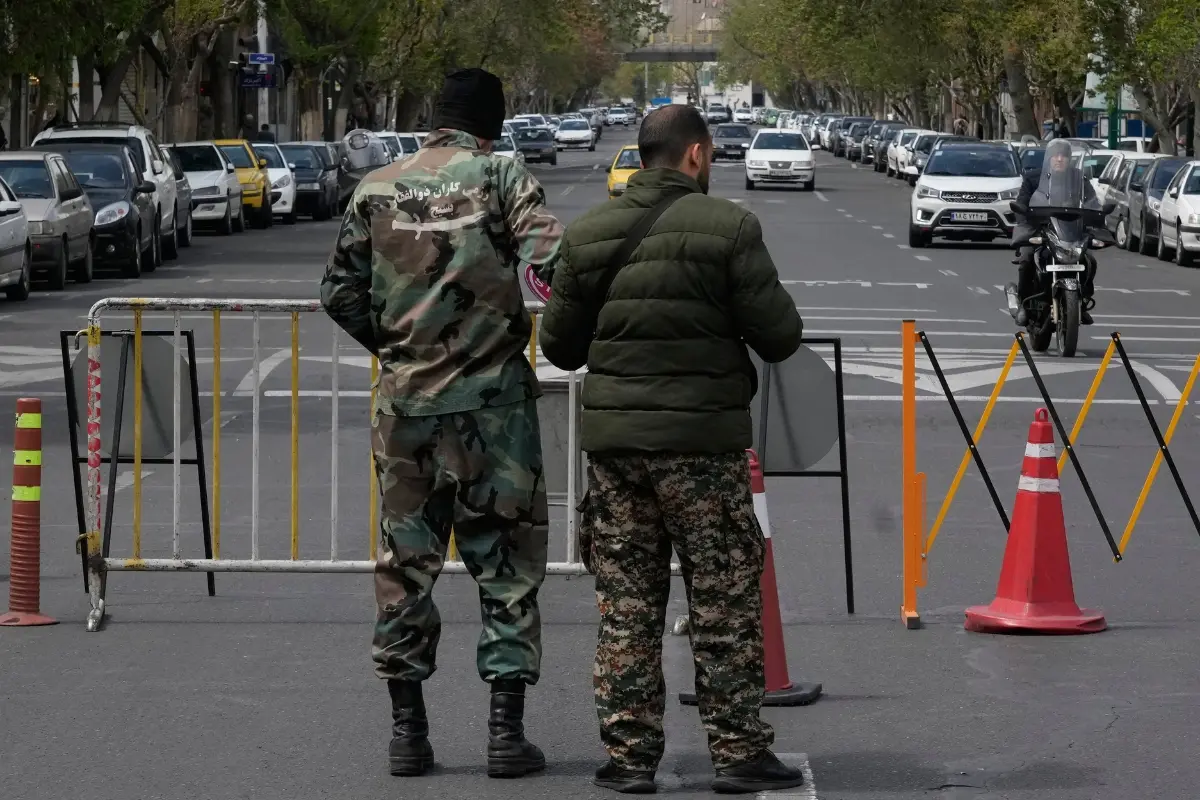 Members of the Basij paramilitary force stand at a checkpoint in Tehran, Iran | Photo: AP