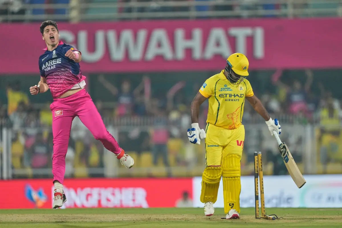 Rajasthan Royals's Nandre Burger, left, celebrates the wicket of Chennai Super Kings' Sanju Samson  | Photo: AP