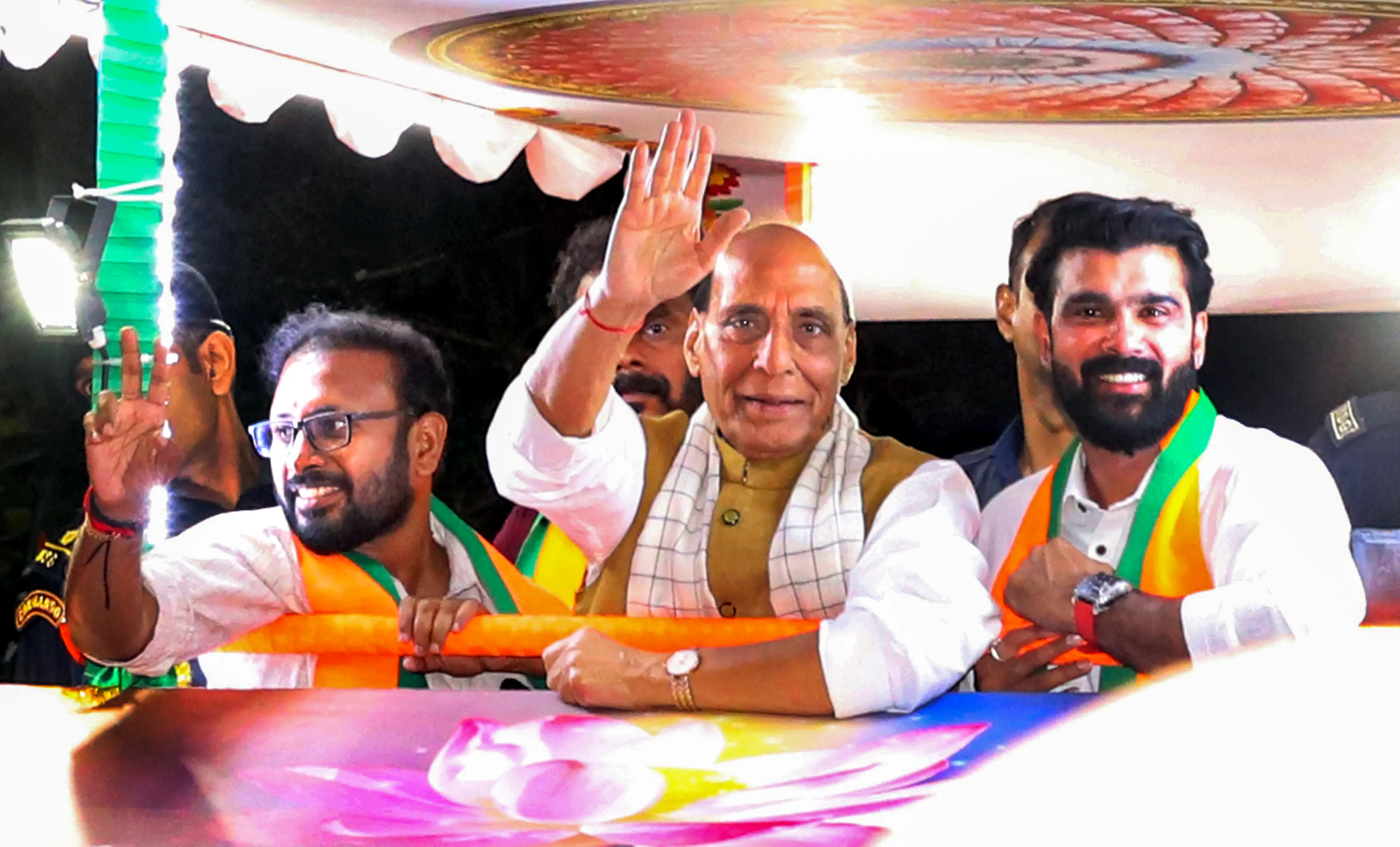 Defence Minister Rajnath Singh during a roadshow ahead of the Kerala Assembly elections, in Thiruvananthapuram | Photo: PTI