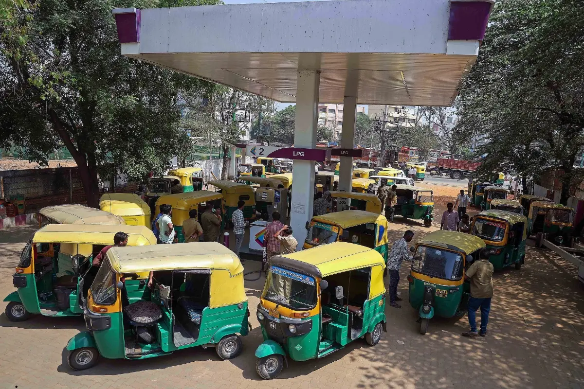 Auto-rickshaws queue at an LPG filling station in Laggere area of Bengaluru as drivers arrive early due to a shortage of auto LPG gas, in Bengaluru.| Photo: ANI