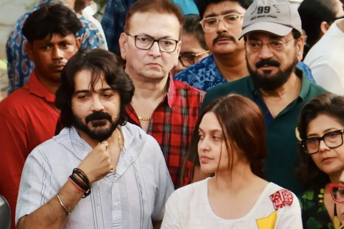 Priyanka Sarkar (Centre) stands with members of the Bengali film fraternity during a protest march demanding justice for Rahul Banerjee, as calls for accountability grow louder in the wake of his death.