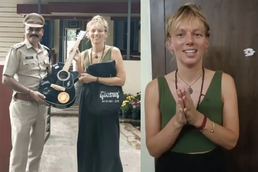 Dutch traveler Renske Roos Termeulen happily posing with her recovered guitar alongside the RPF officers at the Mysore railway office.