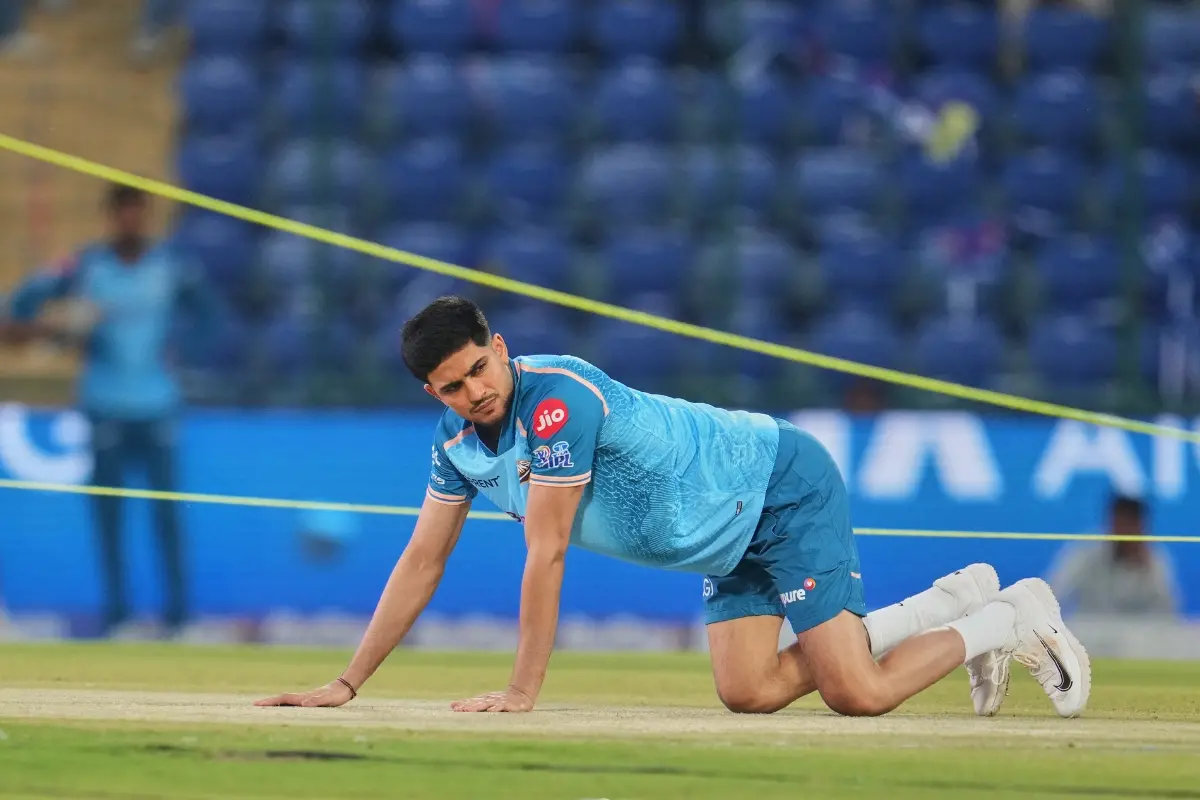 Gujarat Titans' captain Shubman Gill inspects the pitch before the start of the Indian Premier League cricket match against Delhi Capitals in New Delhi | Photo: AP