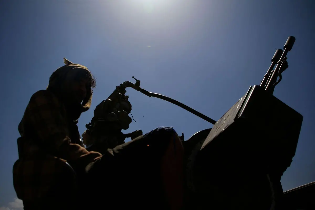 A Yemeni soldier keeps vigil from a vehicle as supporters of the Iran-backed Houthi movement, rally in solidarity with Iran and Lebanon, in Sanaa on April 8, 2026 (Photo: AFP)