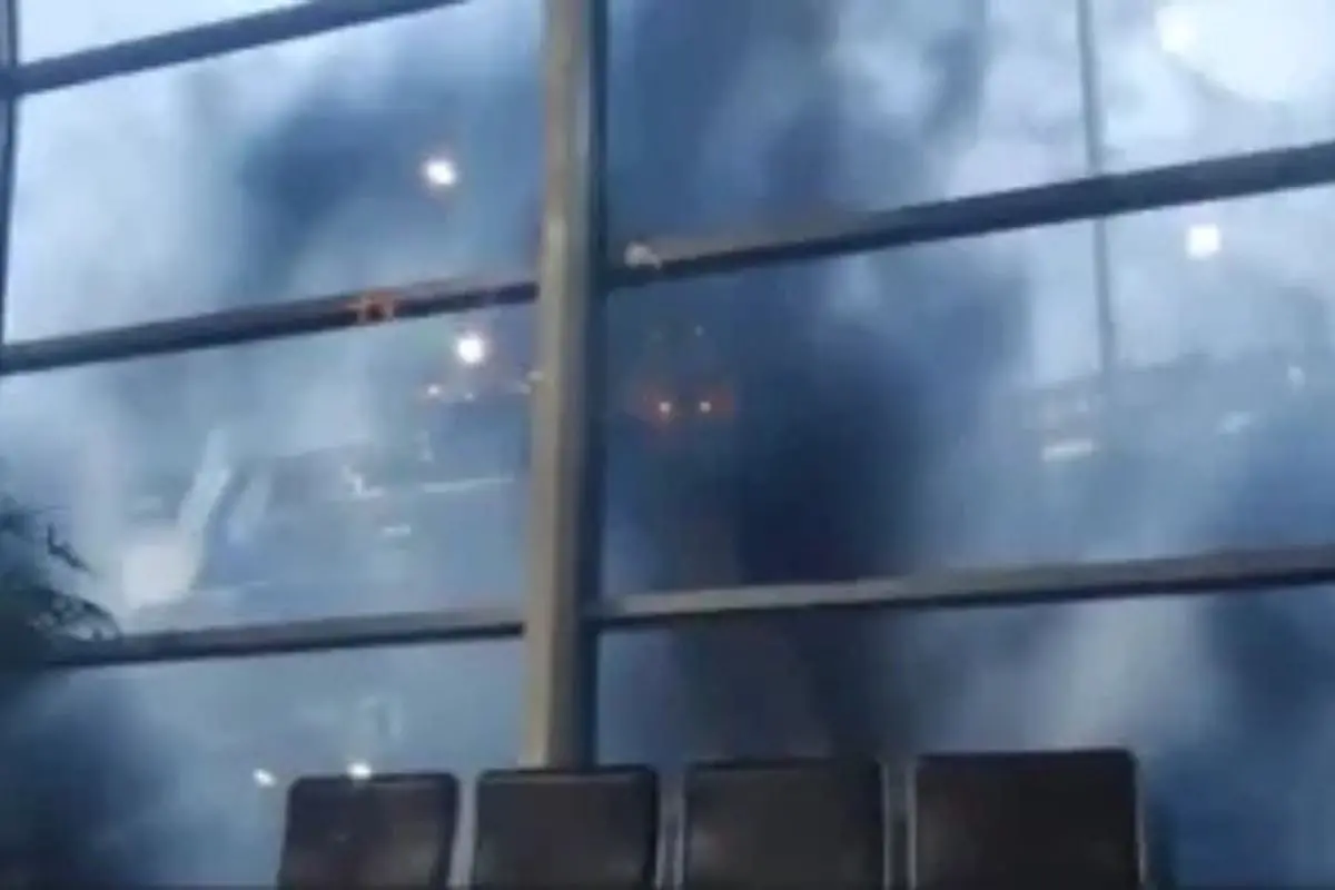Thick smoke billows inside Terminal 1 of Mumbai Airport after a fire broke out, triggering panic among passengers before being swiftly contained. (Screengrab: X video)