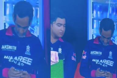 മത്സരത്തിനിടെ ഡഗൗട്ടിൽ നിന്ന് ഫോൺ ഉപയോഗിച്ച് രാജസ്ഥാൻ മാനേജർ, സ്ക്രീനിൽ നോക്കി വൈഭവ്; വൻ വിവാദം