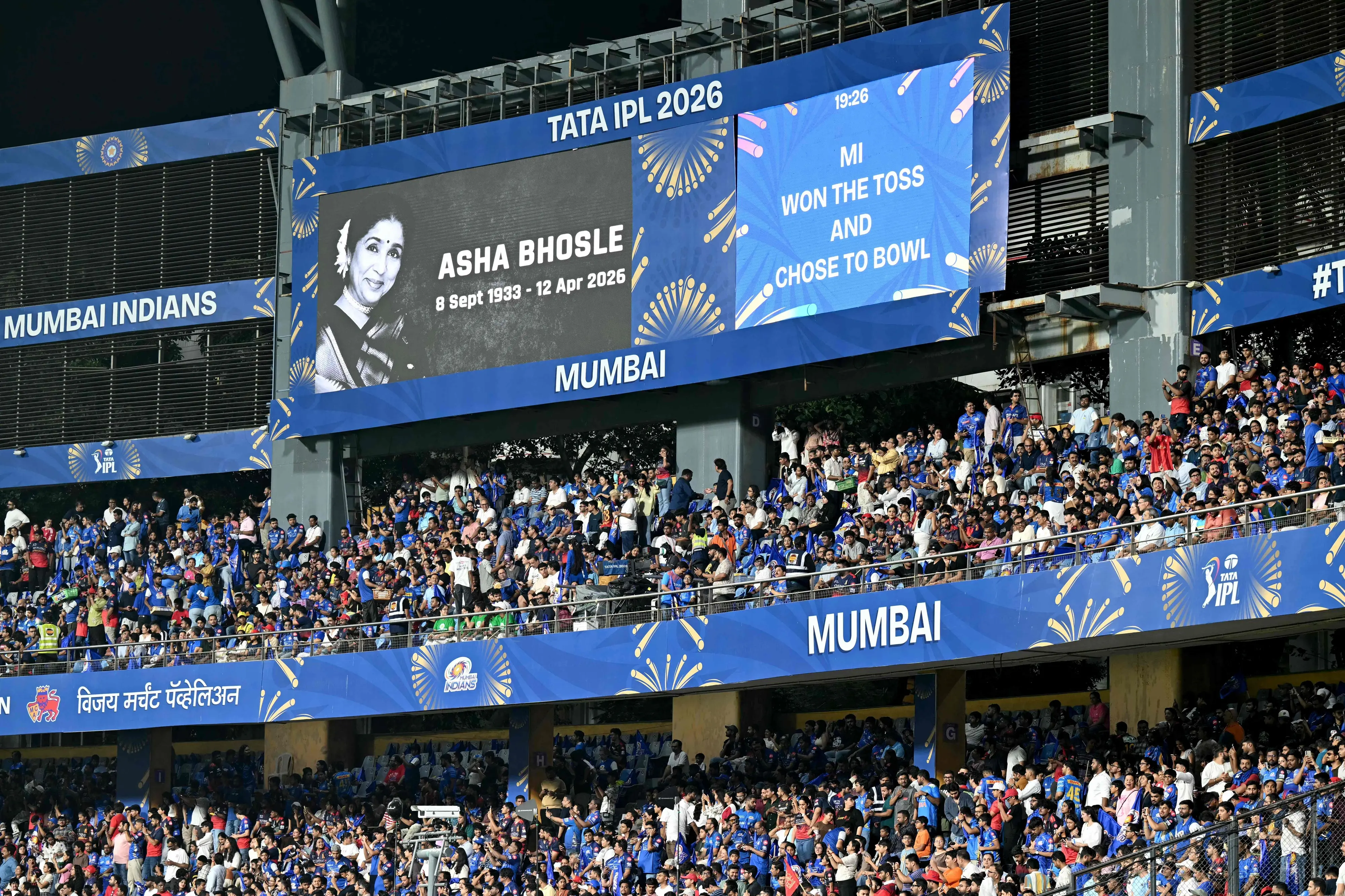 Portrait of late Bollywood playback singer Asha Bhosle displayed on digital screen as a mark of tribute before MI vs RCB IPL match at the Wankhede Stadium | Photo: AFP