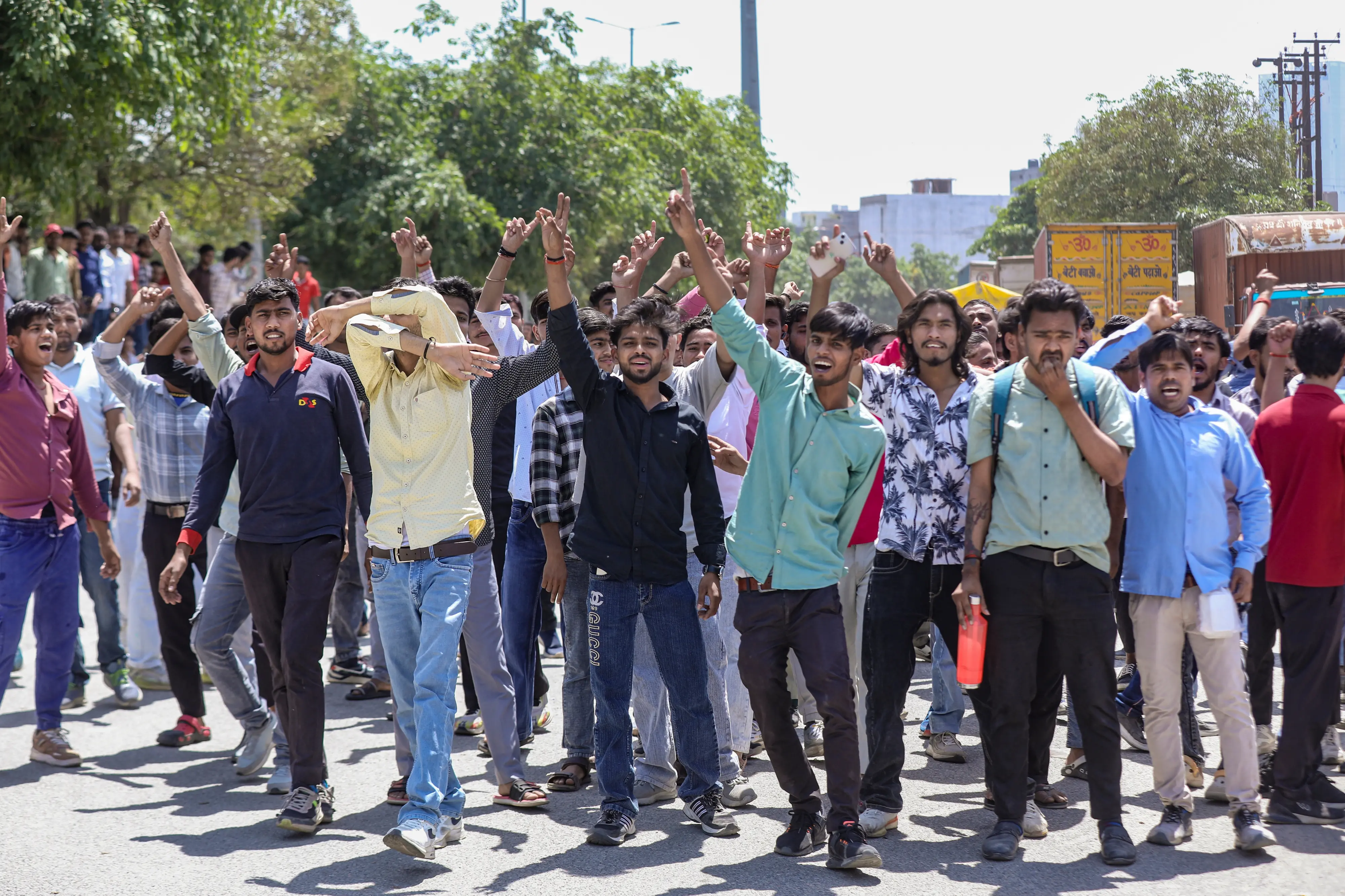 Factory workers during a protest demanding a hike in wages, in Noida