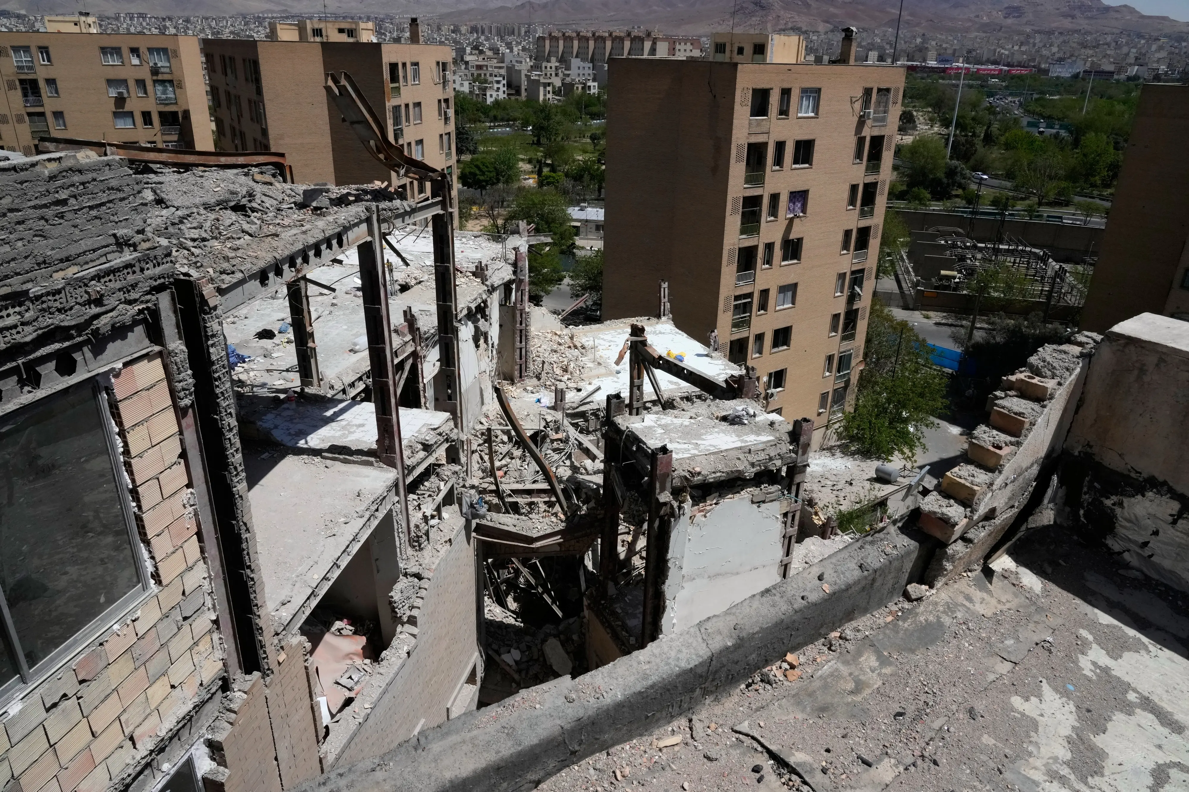 Damage is visible on a residential building that, according to Iranian authorities, was hit by a strike on March 4 during the U.S.-Israeli military campaign, in southeastern Tehran | AP