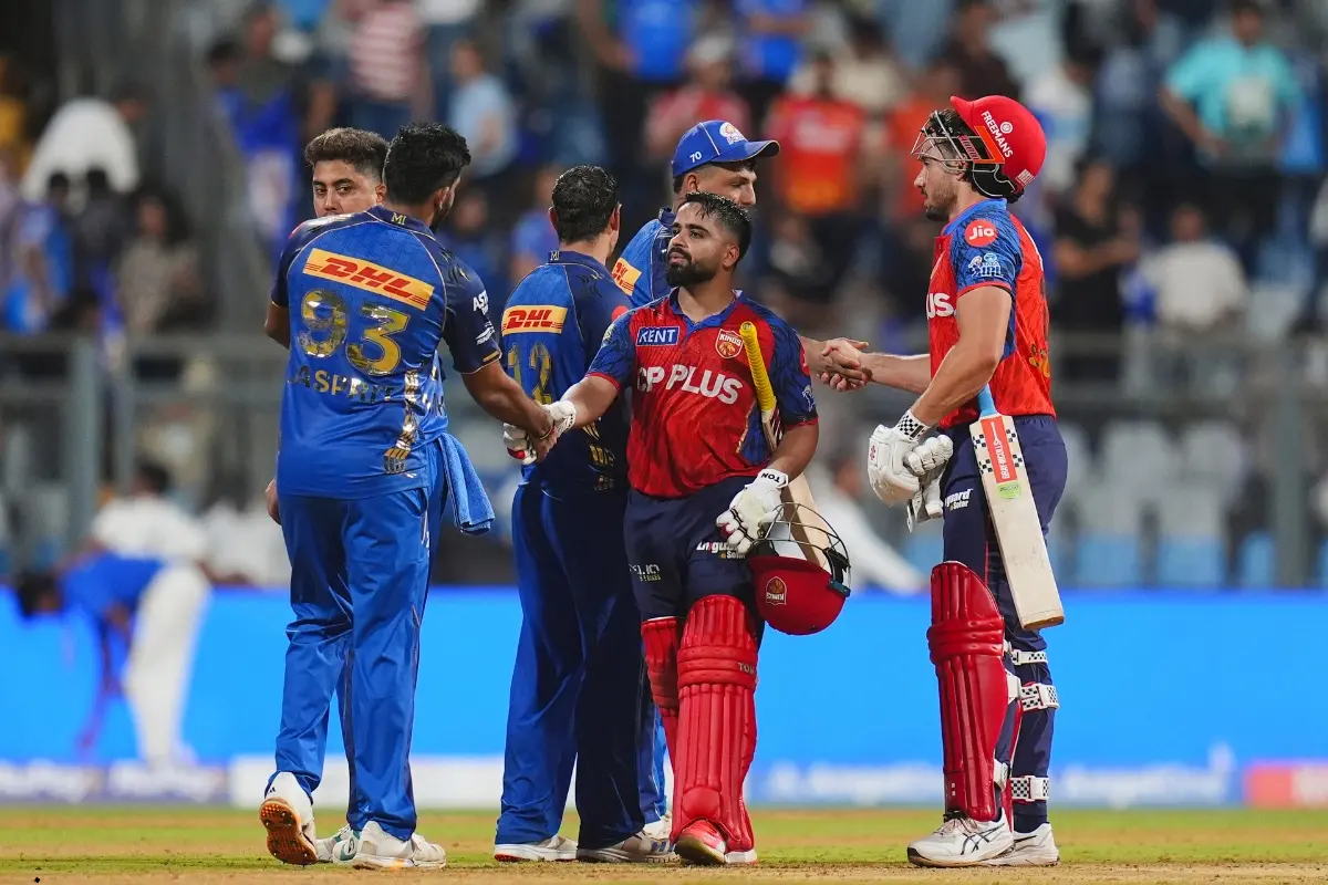 Player shake hands after Punjab Kings won the Indian Premier League (IPL) 2026 T20 cricket match between Mumbai Indians and Punjab Kings, at Wankhede Stadium in Mumbai.| Photo: PTI