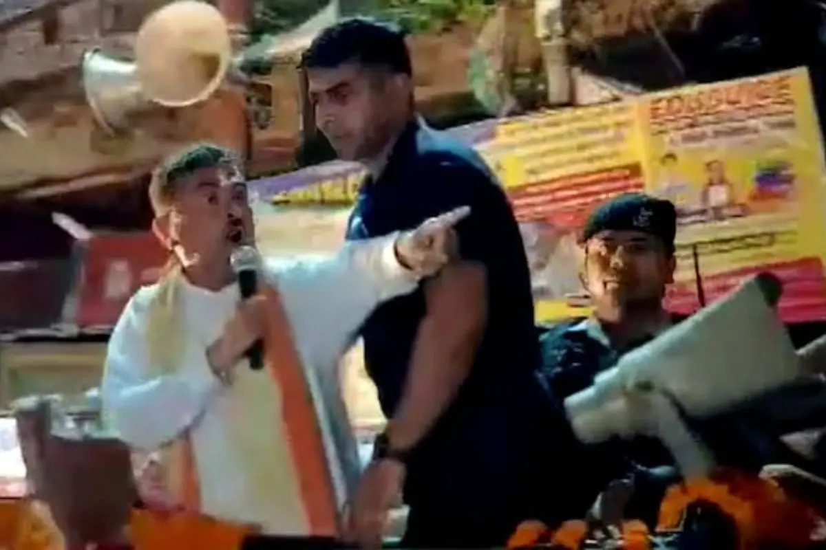 Suvendu Adhikari gestures angrily and shouts into the mic during a BJP roadshow in Howrah as slogan clash erupts with TMC supporters. (Screengrab: X)
