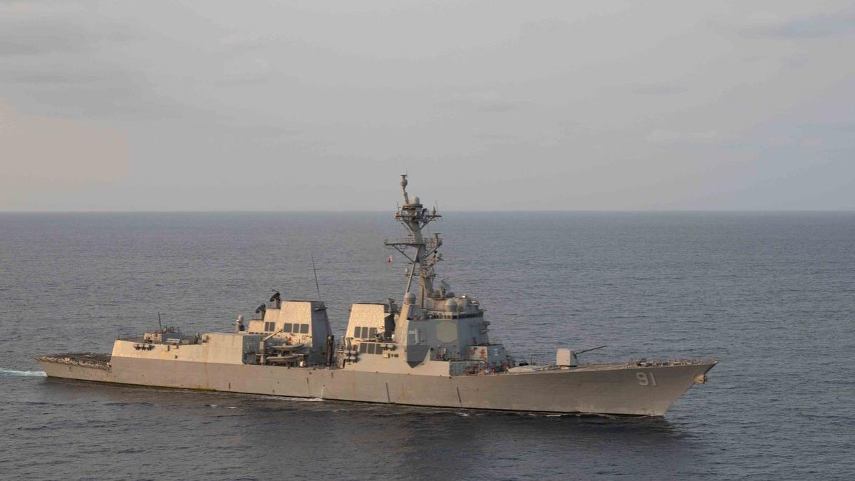 Tensions escalate in the Arabian Sea and Strait of Hormuz as US Central Command confirms USS Rushmore is conducting blockade operations, supported by USS Pinckney and USS New Orleans.