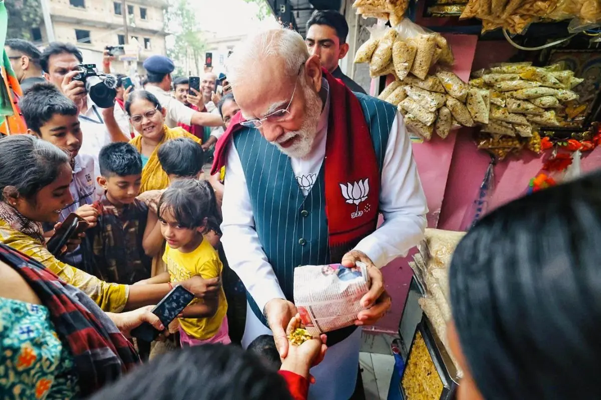 Voters surround PM Narendra Modi, seeking selfies as he engages with locals during campaign. (Photo: X)