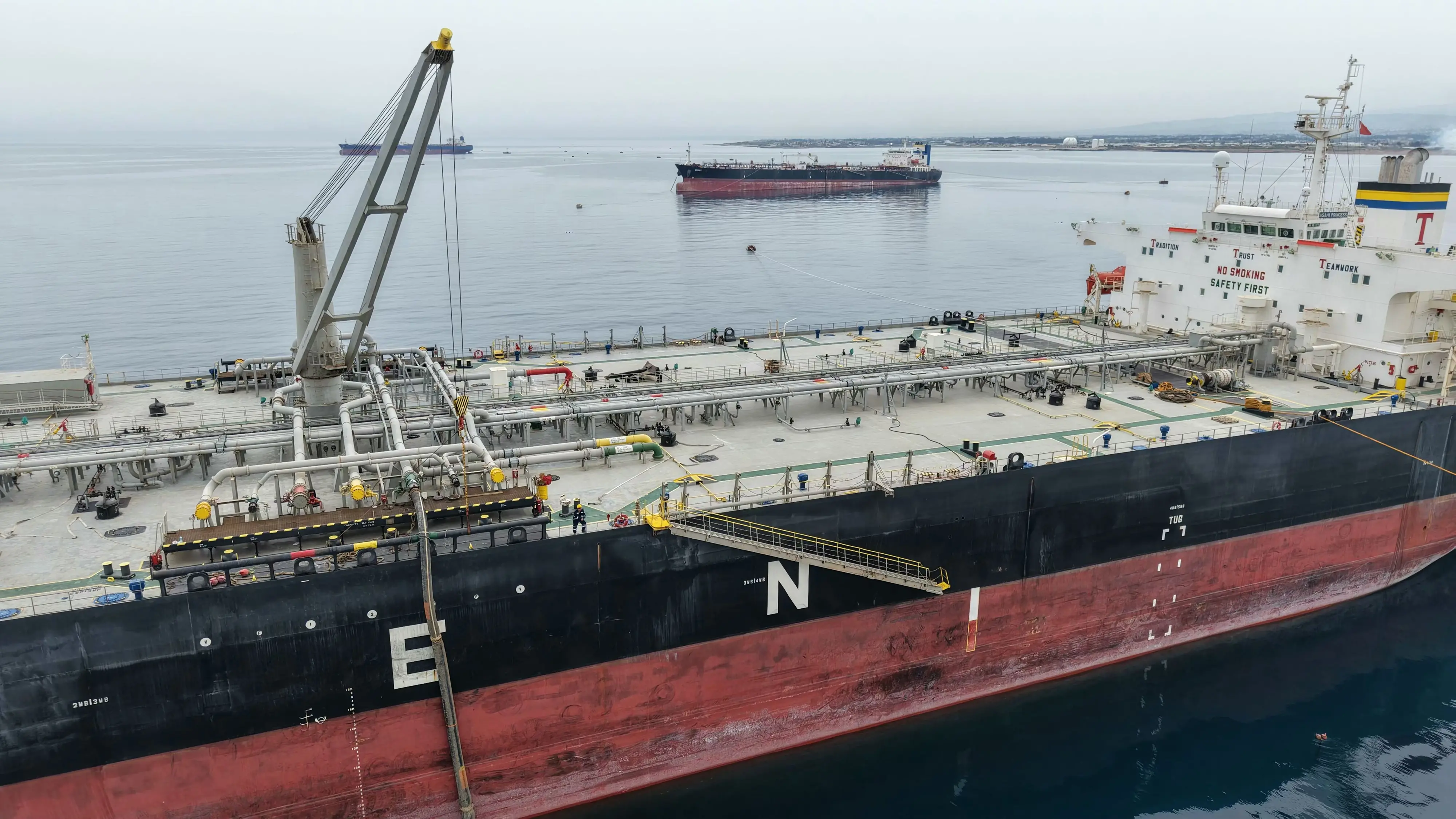 The Greek-flagged crude oil tanker "Asahi Princess" is made ready at the Syrian Baniyas port refinery on the  coast of the Mediterranean Sea | AFP