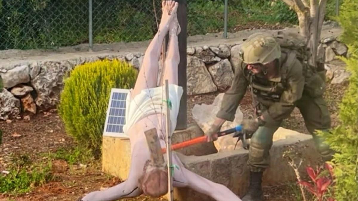 IDF confirms viral photo: Israeli soldier caught desecrating Jesus statue in Lebanon