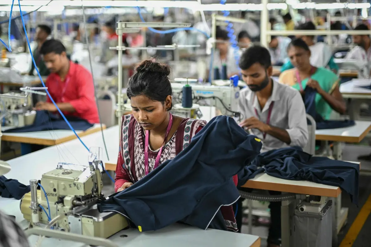 File photo: Employees work at a garment factory in Tiruppur | Photo- AFP