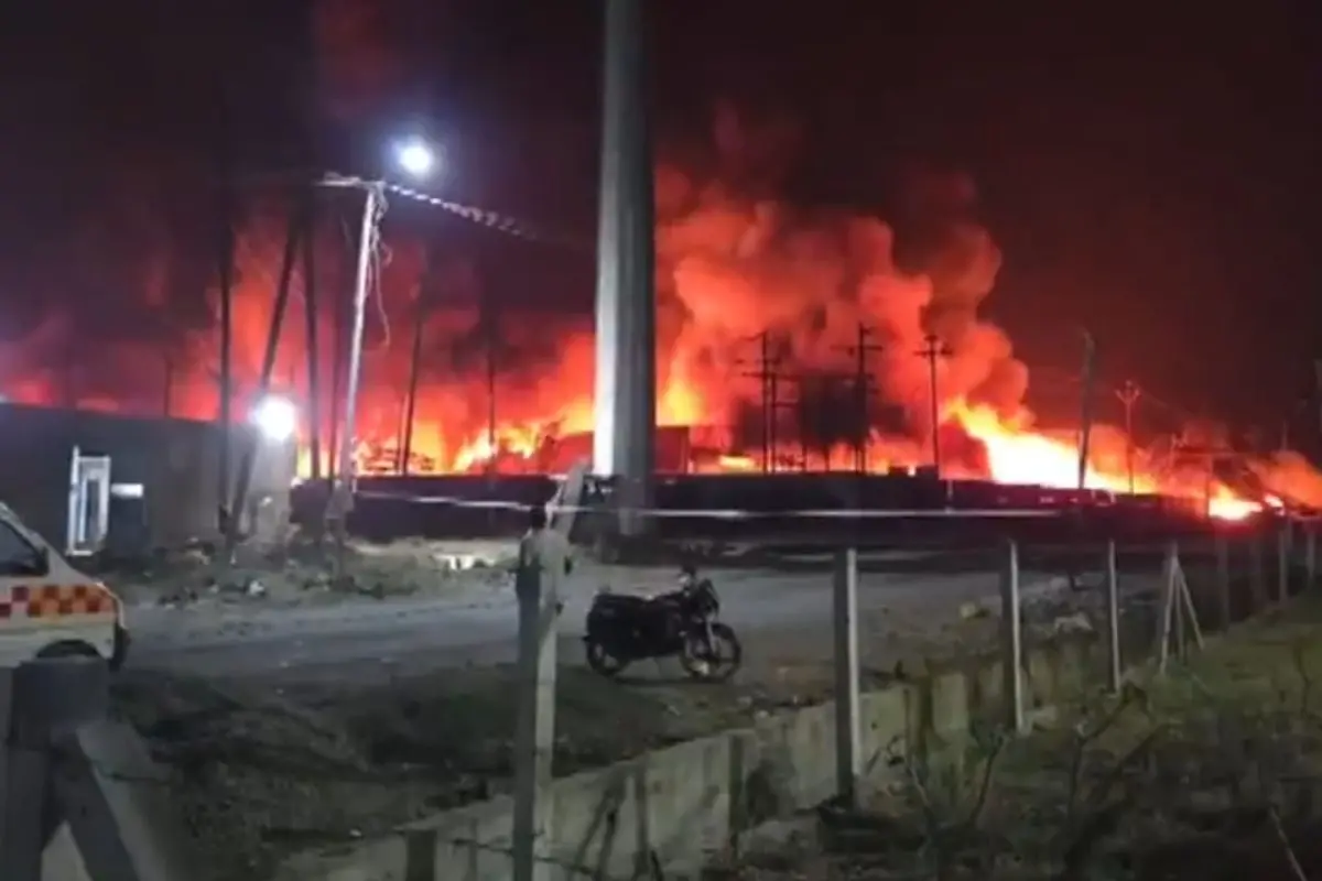 Flames and thick smoke engulf the Dhar waste plant after explosions, as emergency teams battle the raging overnight blaze in Pithampur (Screengrab: ANI video)