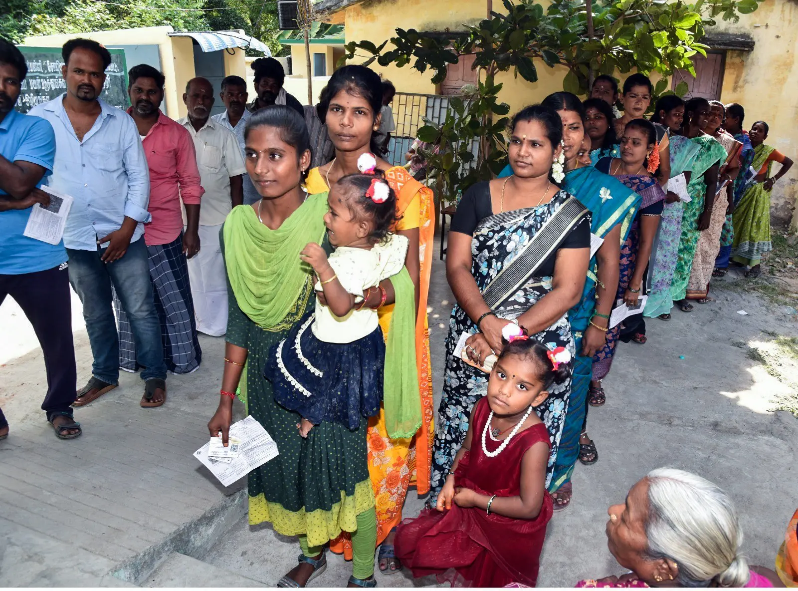 Voters stand in queues at a polling station to cast their vote in the Tamil Nadu Assembly elections 2026, in Viluppuram on Thursday | Photo: ANI
