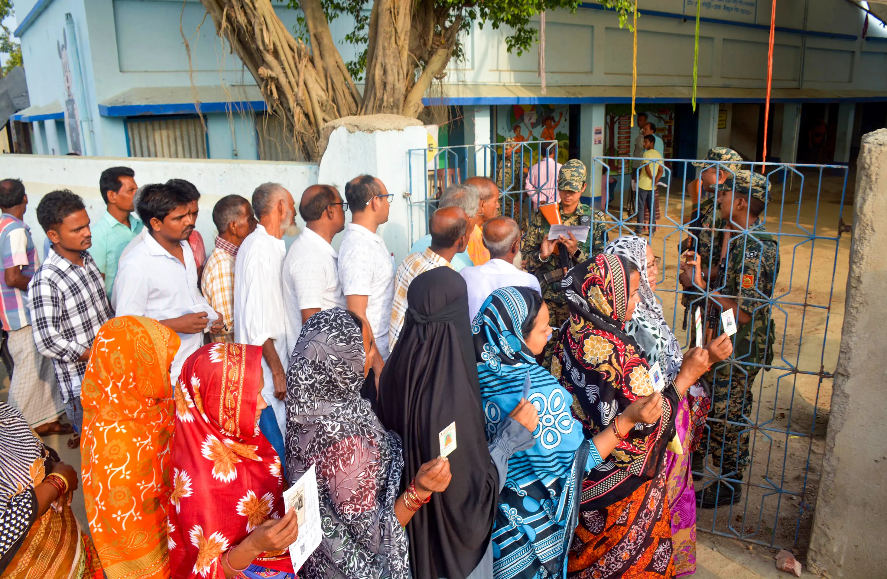 Voters wait to cast their vote at a polling station for the West Bengal Assembly elections, in Birbhum on Thursday | Photo: ANI
