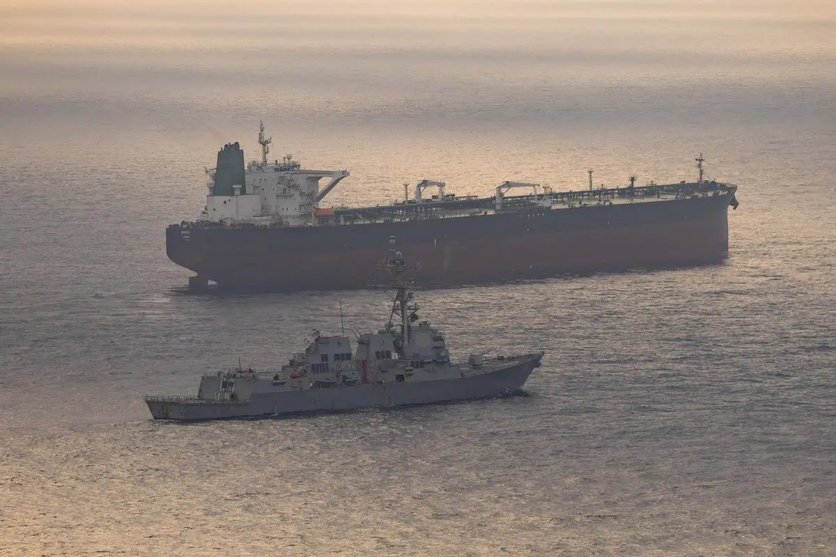 Guided-missile destroyer USS Rafael Peralta (DDG 115) enforces the U.S. blockade on Iranian ports against an Iranian-flagged ship attempting to sail to a port in Iran | Photo: @CENTCOM on X
