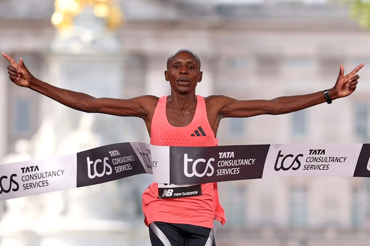 Sebastian Sawe from Kenya crosses the finish line to win the men's race at the London Marathon. | Photo: AP