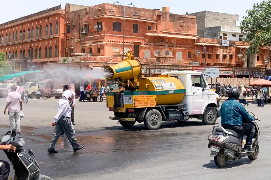 In view of the intense heat, Jaipur Municipal Corporation deploys water-sprinkling vehicles to spray water on roads