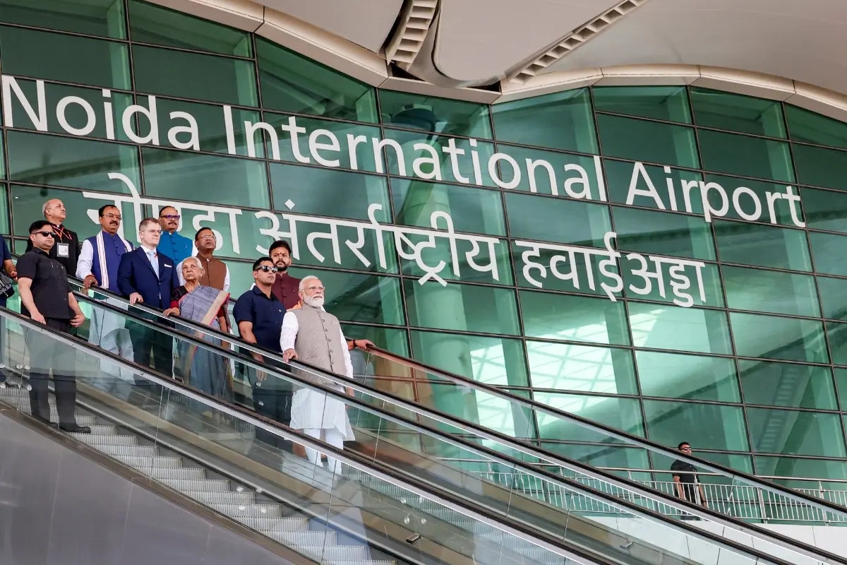 Prime Minister Narendra Modi with Union Civil Aviation Minister Kinjarapu Ram Mohan Naidu, Uttar Pradesh Governor Anandiben Patel, and others, during inauguration of the newly constructed Noida International Airport, in Noida, Uttar Pradesh.| Photo: PMO
