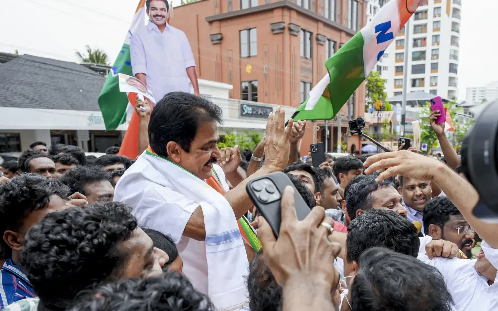 MP KC Venugopal celebrates with party workers in Thiruvananthapuram | PTI