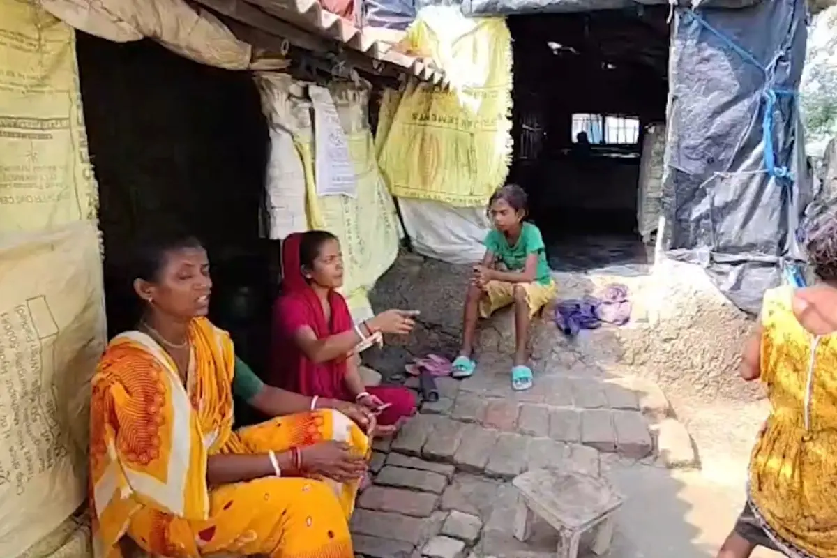 Residents sit outside damaged homes amid tension in Sandeshkhali after violent clashes between rival political groups triggered fresh unrest in the area.