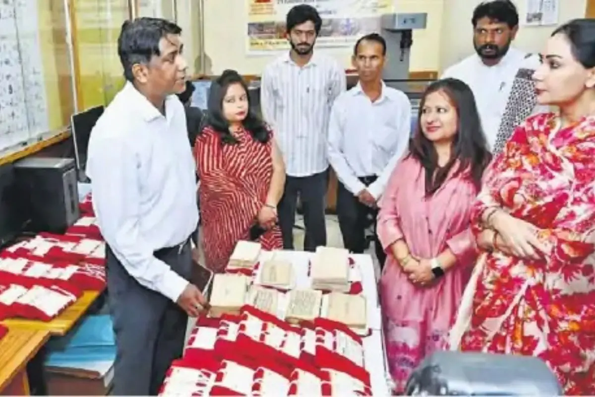 Deputy Chief Minister Diya Kumari reviews ancient manuscripts during her visit to the Vedic Heritage Manuscript Research Institute under the Gyan Bharatam Mission.