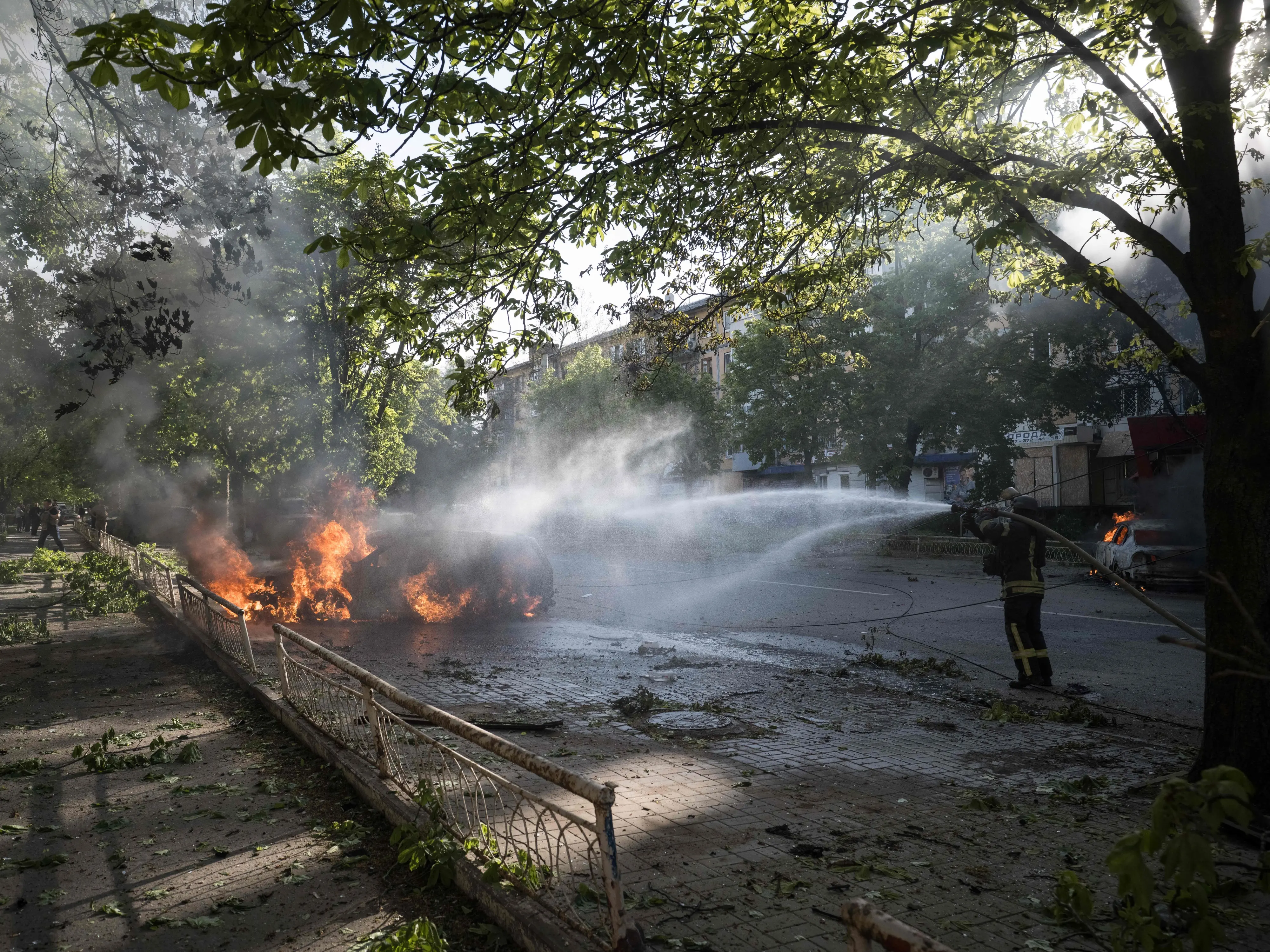 Ukrainian firefighter extinguishing a blaze at the site of a Russian air attack in Kramatorsk, eastern Donetsk region, amid the Russian invasion of Ukraine. | AFP