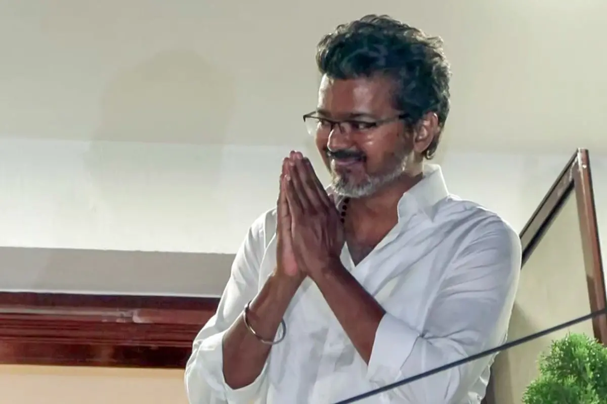 Tamilaga Vettri Kazhagam (TVK) President Vijay greets the crowd from his father's residence during vote counting for the Tamil Nadu assembly elections, in Chennai on May 4. (ANI Video Grab)