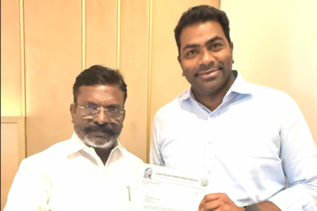 VCK president Thol. Thirumavalavan gives the official confirmation letter to Aadhav Arjuna - TVK General Secretary | Photo: ANI