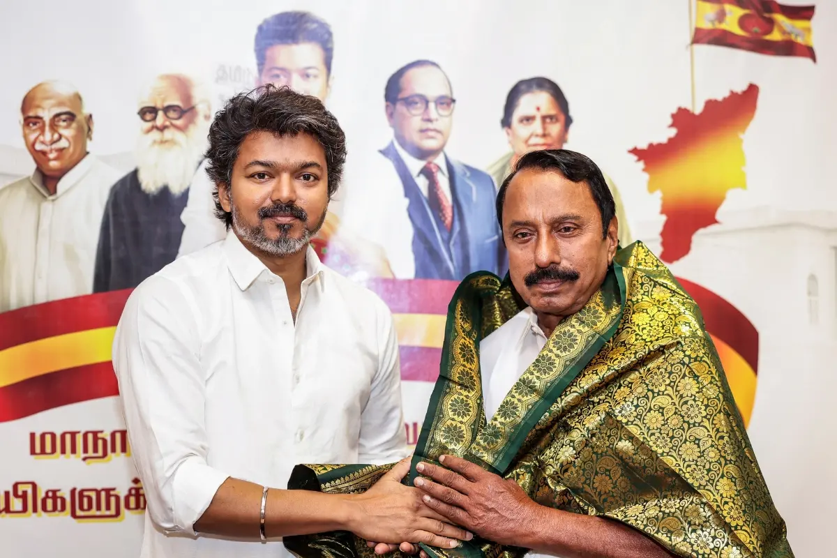 Tamilaga Vettri Kazhagam (TVK) leader Vijay with K.A. Sengottaiyan.| Photo: PTI