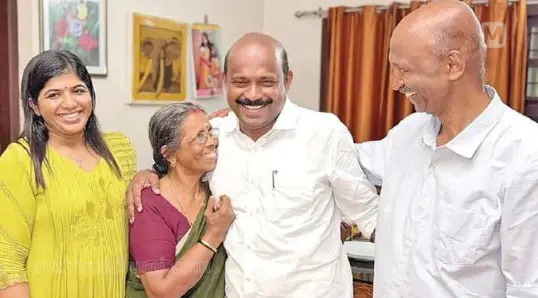 Minister Liju with his father Mohanlal, mother Chandrika, wife Ambili and daughter Gagana Liju