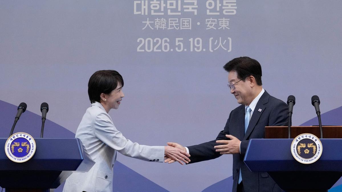 South Korea’s Lee Jae-myung and Japan PM Takaichi hold...