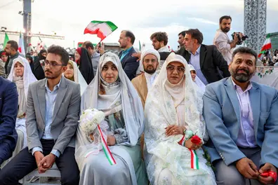 Why Iran is holding mass public weddings amid rising wartime tensions