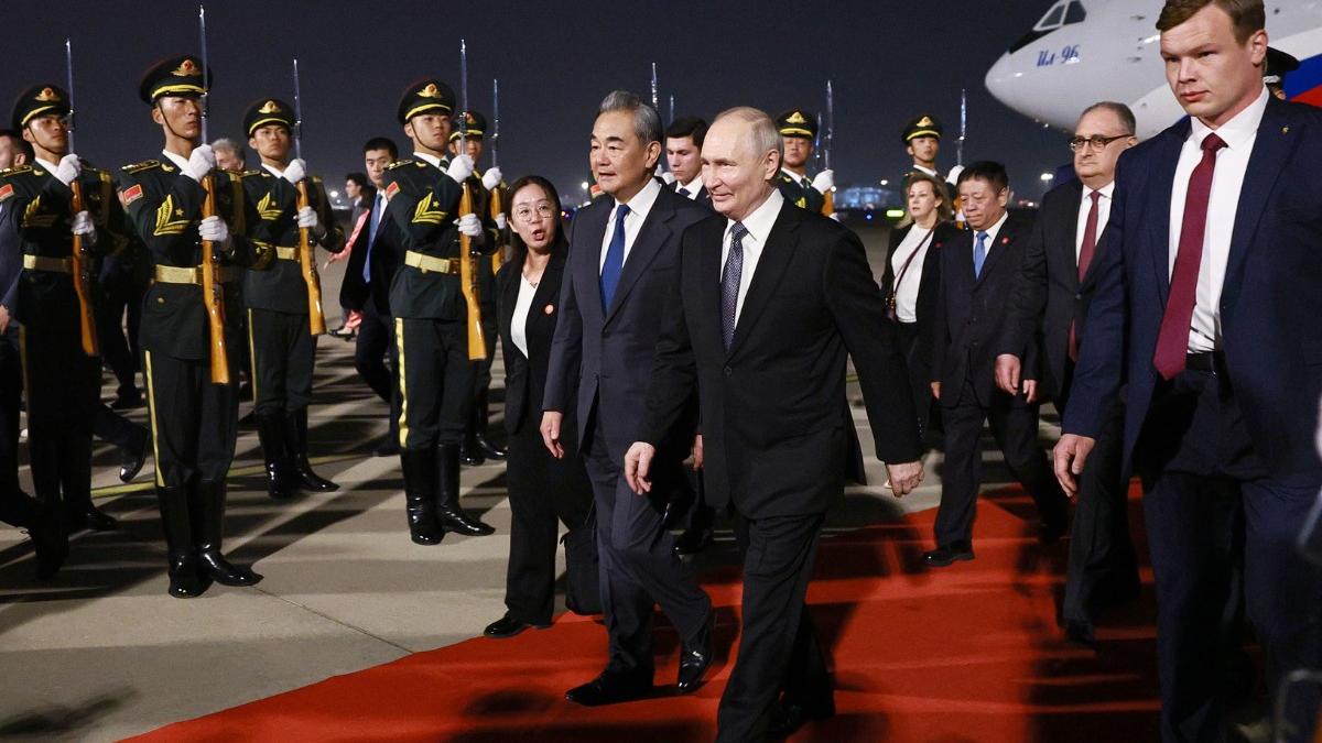 Days after Trump visit, Putin lands in Beijing for key summit