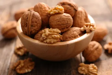 Kashmir walnut farmers face heavy losses amid unusual weather conditions
