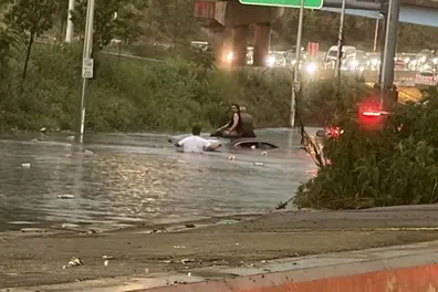 ‘Turn around, don’t drown’: US officials warn as floods disrupt New York and Atlanta
